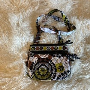 Vera Bradley cross body three compartment zipper mid size bag.